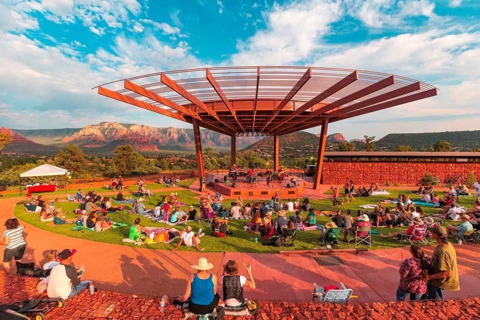 Outdoor live music event in Sedona with red rock views