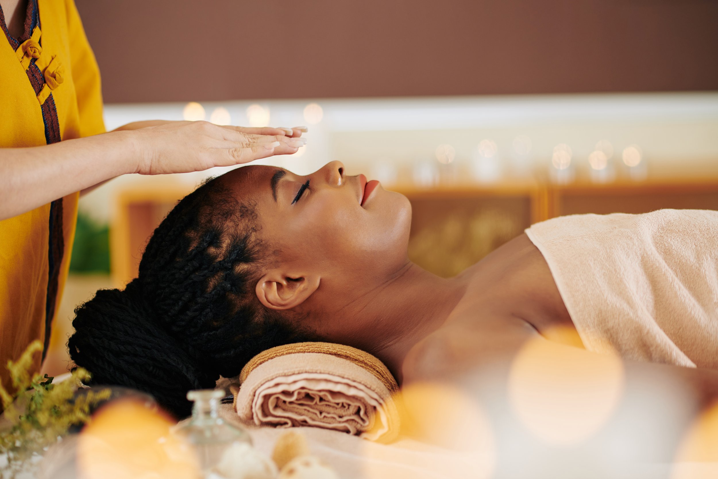 relaxed woman receives Reiki healing at Gateway Cottage Wellness Center in Sedona Arizona